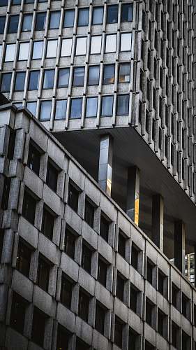 new york photo of gray concrete building during daytime architecture